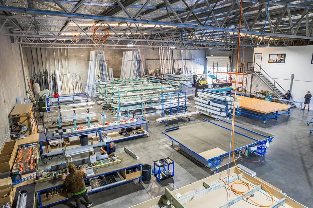 Team at work on the assembly benches of the Smarter Outdoors factory in Wangara